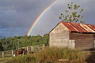 Rustic barn with rainbow © Midginbil Eco Resort