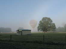 Balloon Flight through morning mist